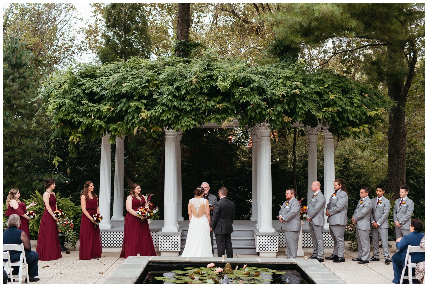 The couple faces the officiant during the intimate destination wedding ceremony