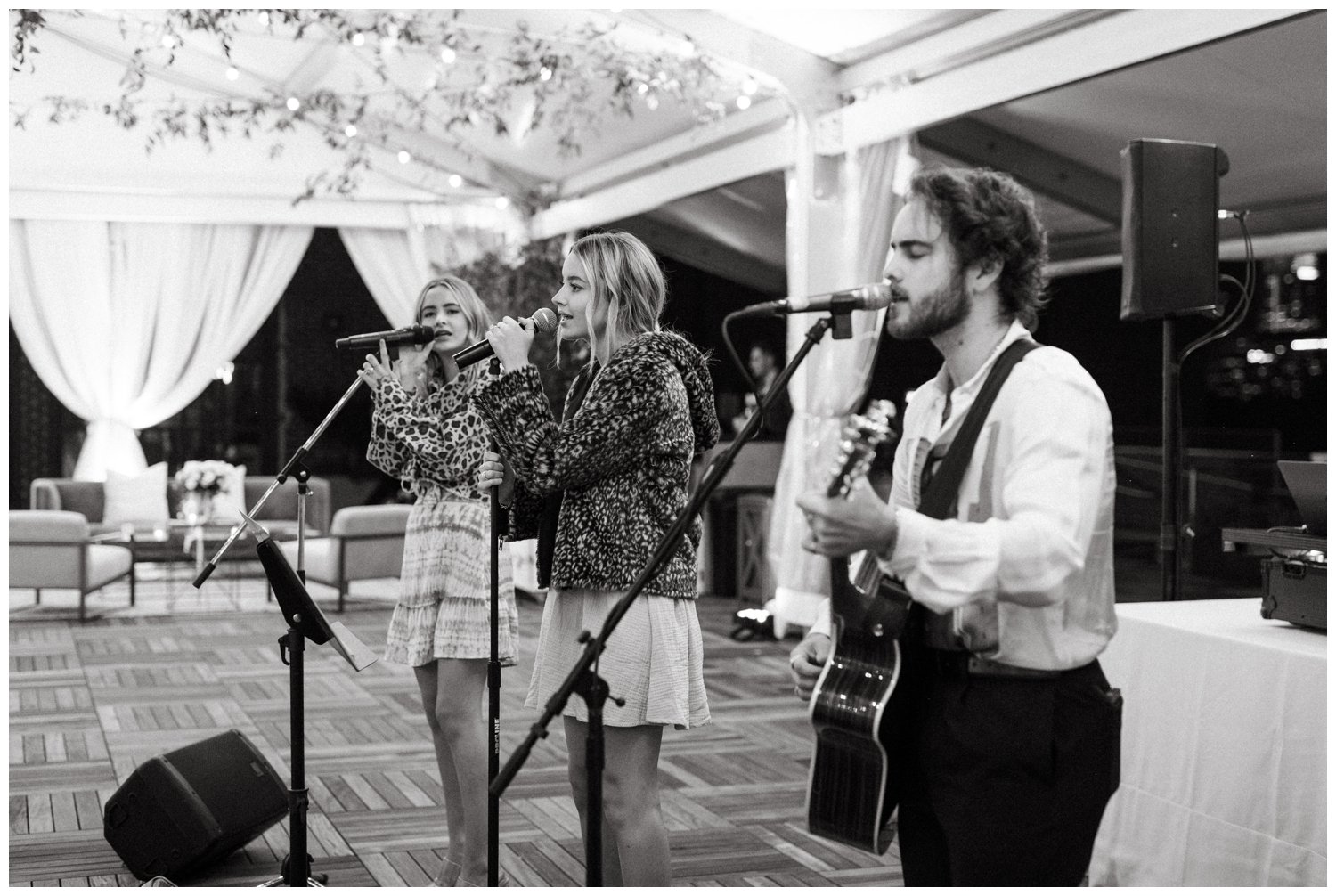 Black and white photo of band Temecula Road playing a small wedding reception