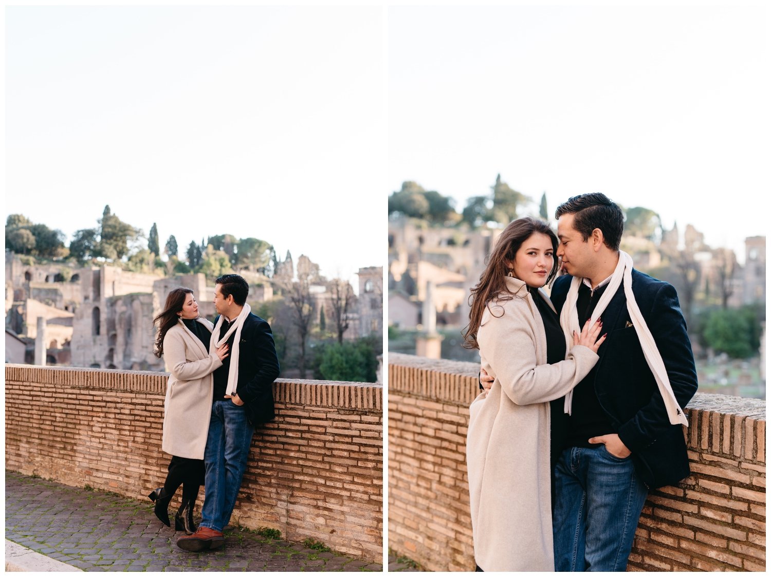The couple leans on a brick wall
